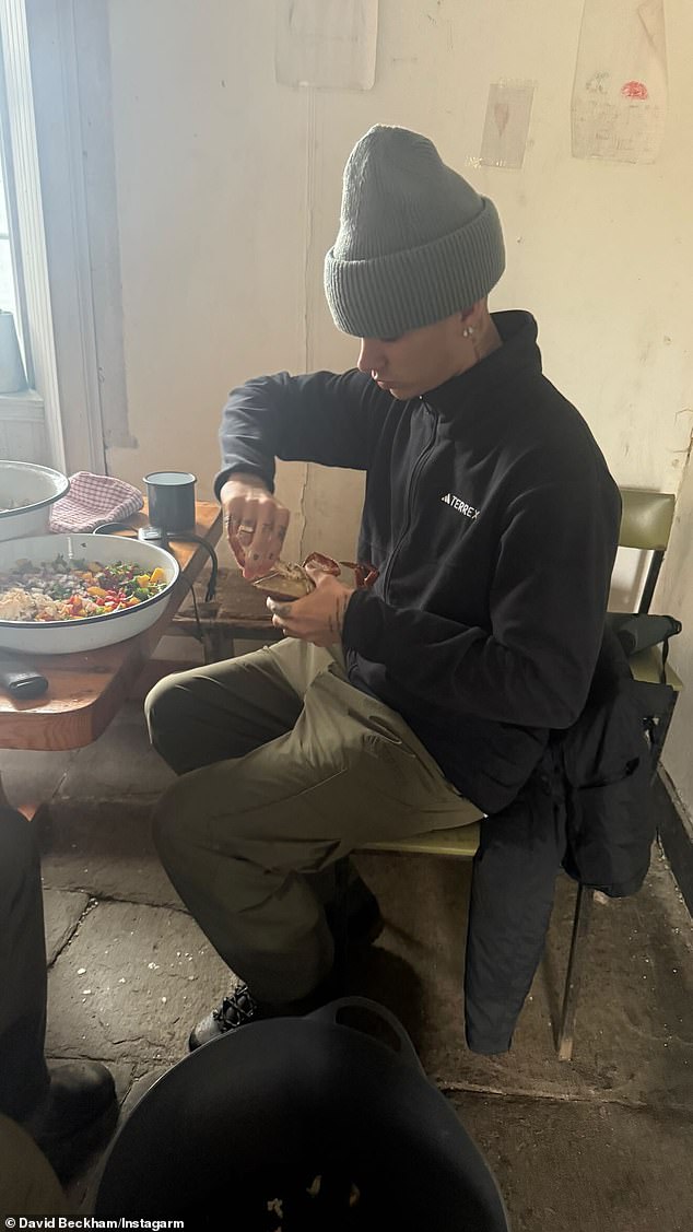 David shared a snap of Romeo preparing their dinner