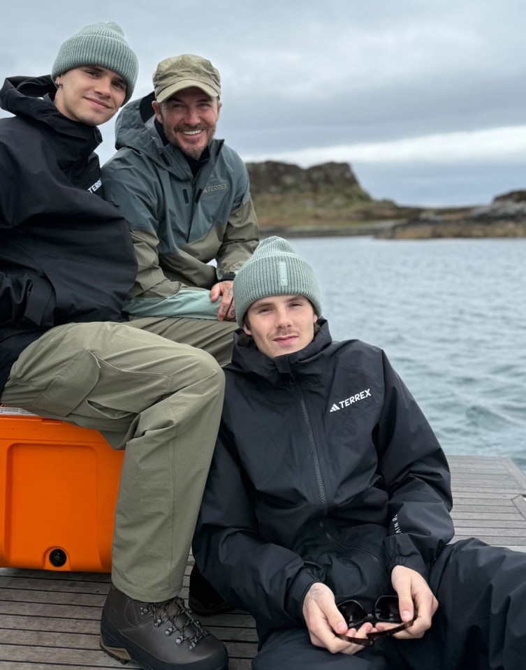 David Beckham and his sons on a fishing trip.