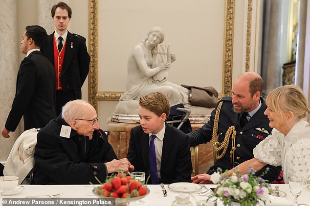 The tea party, which was hosted by the King, included a surprise appearance from Prince George