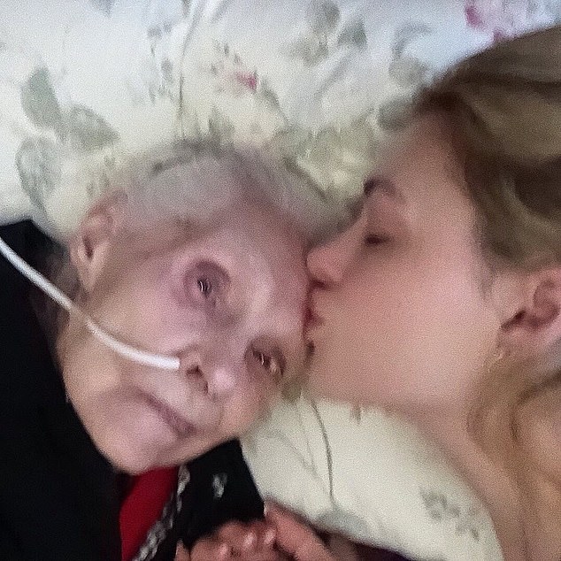 Nicola kisses her late grandmother Gina in a photo she posted on Instagram