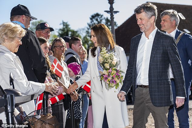 The couple, who usually stay in Amalienborg, Copenhagen, were all smiles as they took in the sunny weather and were welcomed by wellwishers as well as a brass ensemble