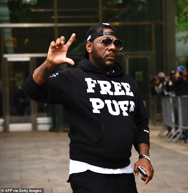 A Diddy fan wearing a 'Free Puff' hoodie outside the Federal Court on Monday