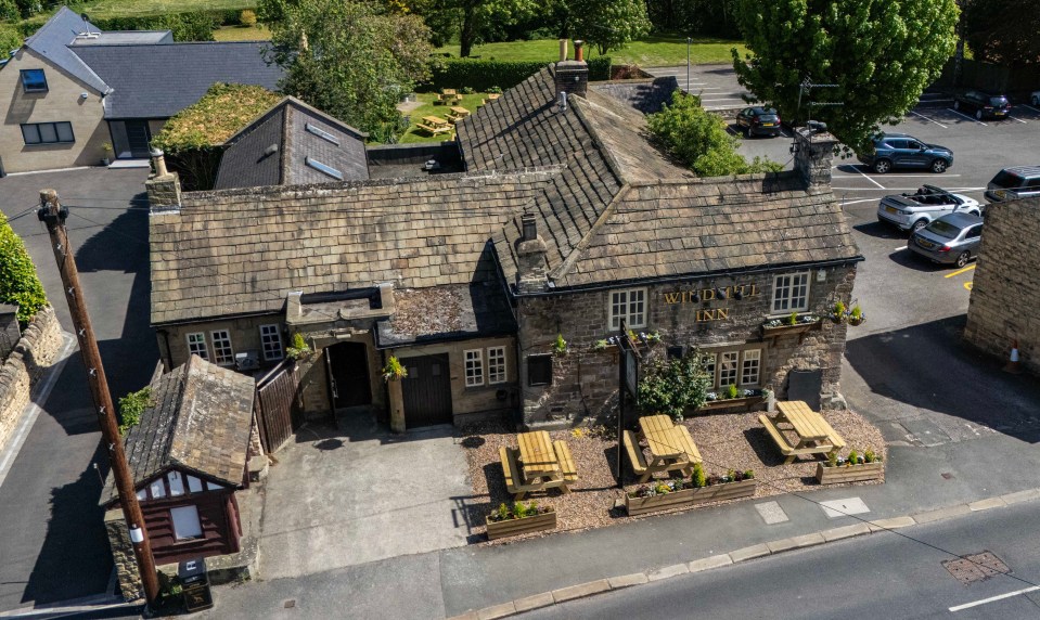 Aerial view of The Windmill Inn, a pub in Linton, reopened after closure.