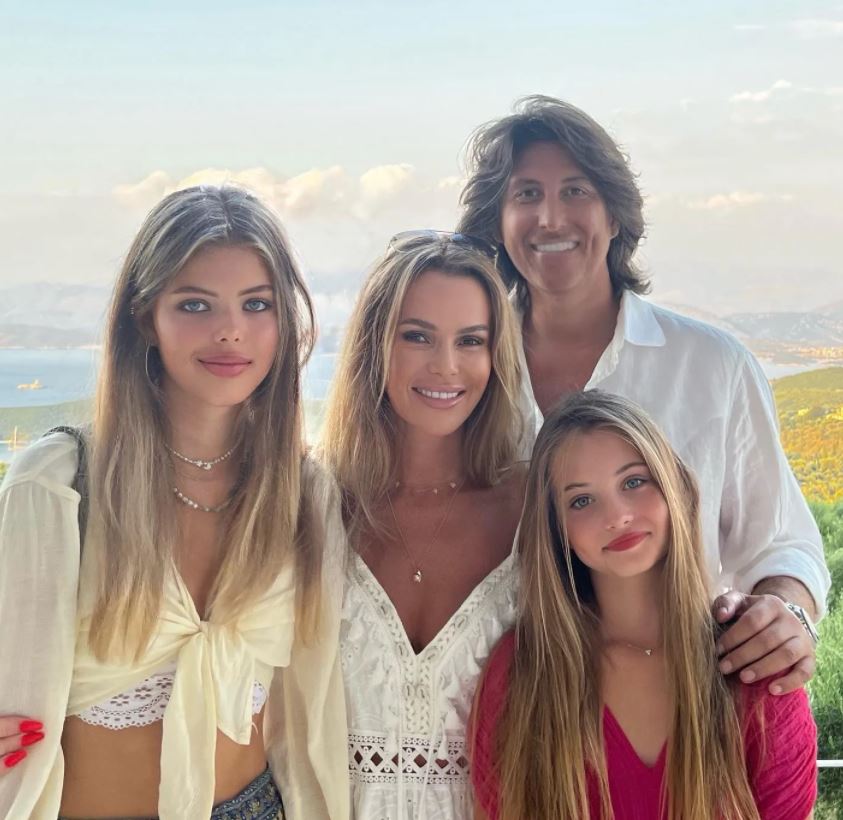 Family photo of Amanda Holden with her husband and two daughters.