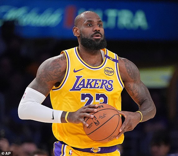 FILE - Los Angeles Lakers forward LeBron James appears during the first half of an NBA basketball game against the Utah Jazz, on Feb. 10, 2025, in Los Angeles. (AP Photo/Mark J. Terrill, File)