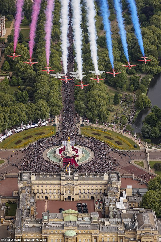 A Ministry of Defence photograph of the Red Arrows and Typhoons taking part in the flypast over Buckingham Palace today