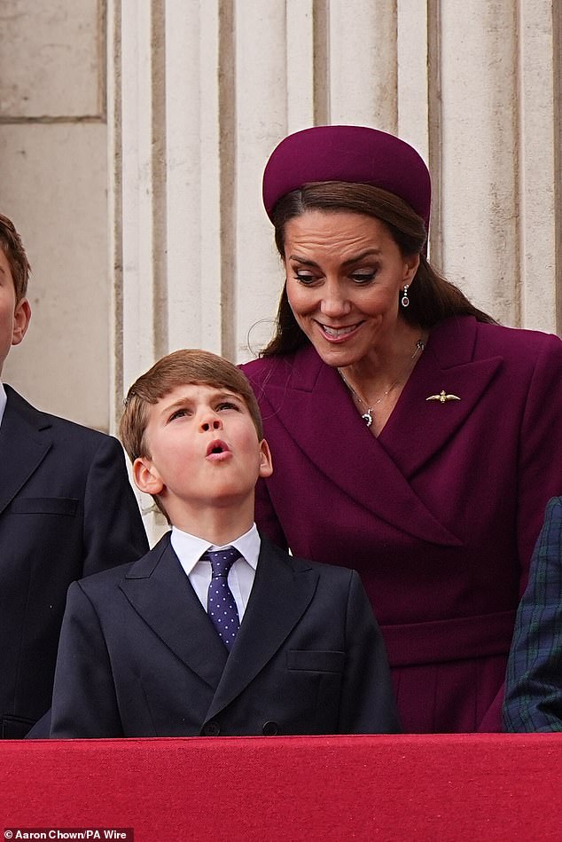 The Princess of Wales and Prince Louis on the balcony of Buckingham Palace to view the flypast this afternoon