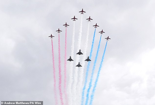 The military fly past passes over The Mall and Buckingham Palace at the end of the procession for VE Day 80 today