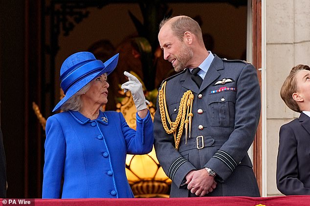 Queen Camilla and the Prince of Wales on the balcony of Buckingham Palace to view the flypast featuring RAF planes today