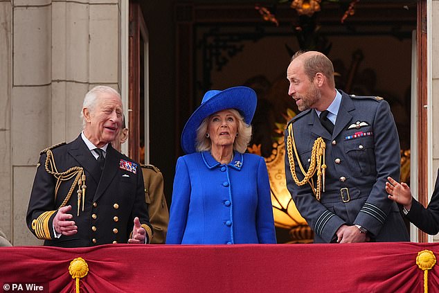 King Charles III and Queen Camilla and the Prince of Wales on the balcony of Buckingham Palace in London today