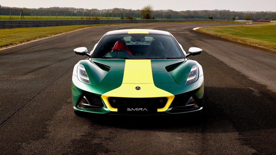 Lotus Emira Clark Edition supercar on a racetrack.