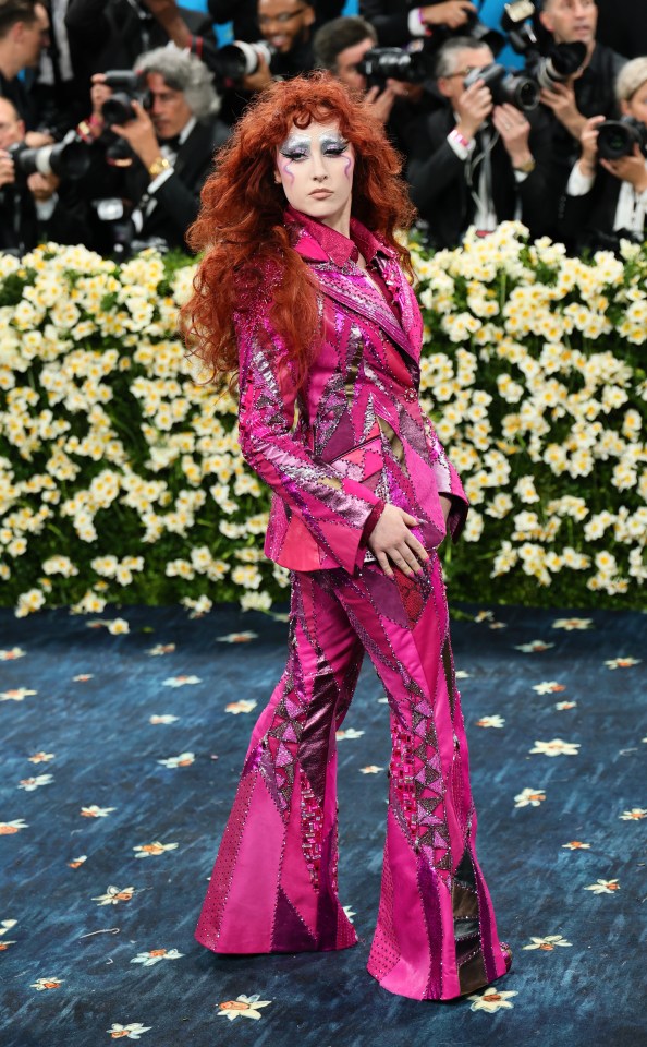 Chappell Roan at the Met Gala in a pink sequined suit.