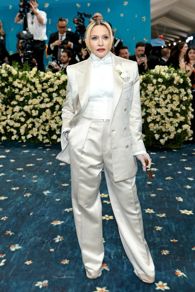 Madonna at the Met Gala in a light beige suit.