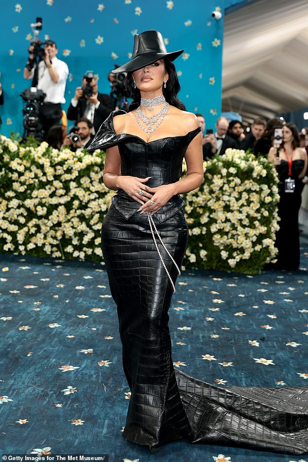 While this year's theme 'Superfine: Tailoring Black Style' presented an opportunity for 'boundary-pushing' looks, the red carpet was besieged by celebrities in drab black and gray outfits; Kim Kardashian pictured