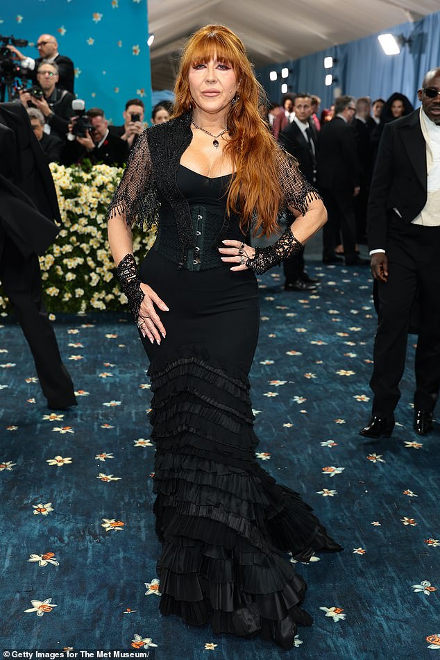 Celebrity makeup artist Charlotte Tilbury sported a ruffled black corset gown that looked similar to several other black gowns on the red carpet