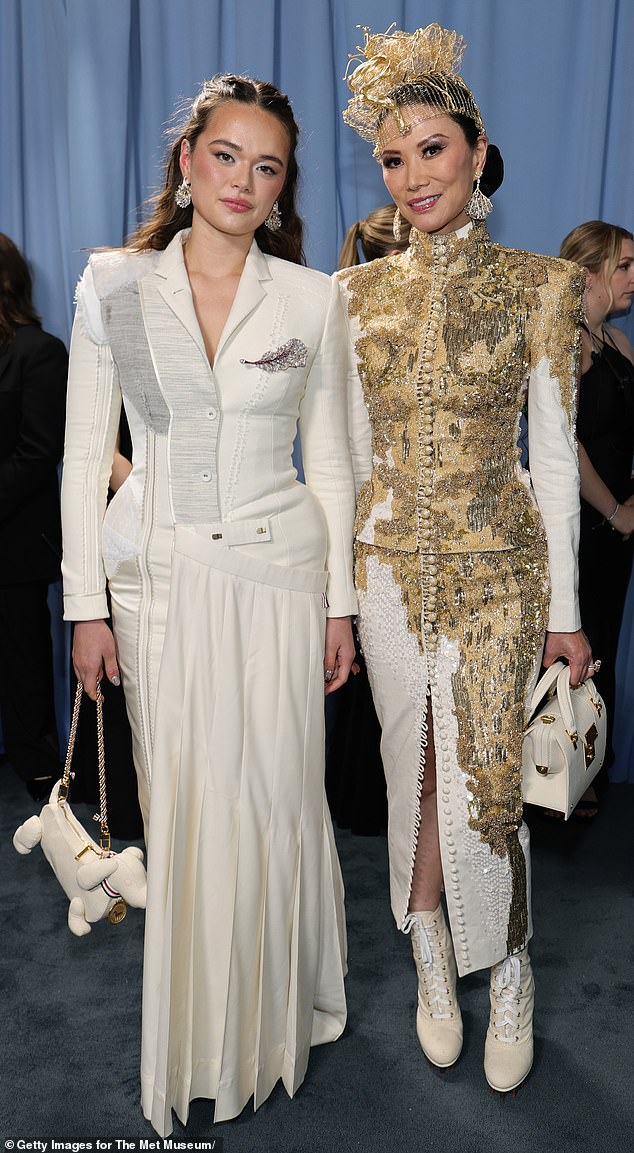 Like her fashion forward daughter, Wendi also turned heads in a very eye-catching outfit from Thom Browne