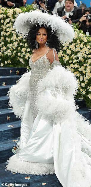 According to an account from Bazaar, Diana's cape was embroidered with the names of her five children and eight grandkids