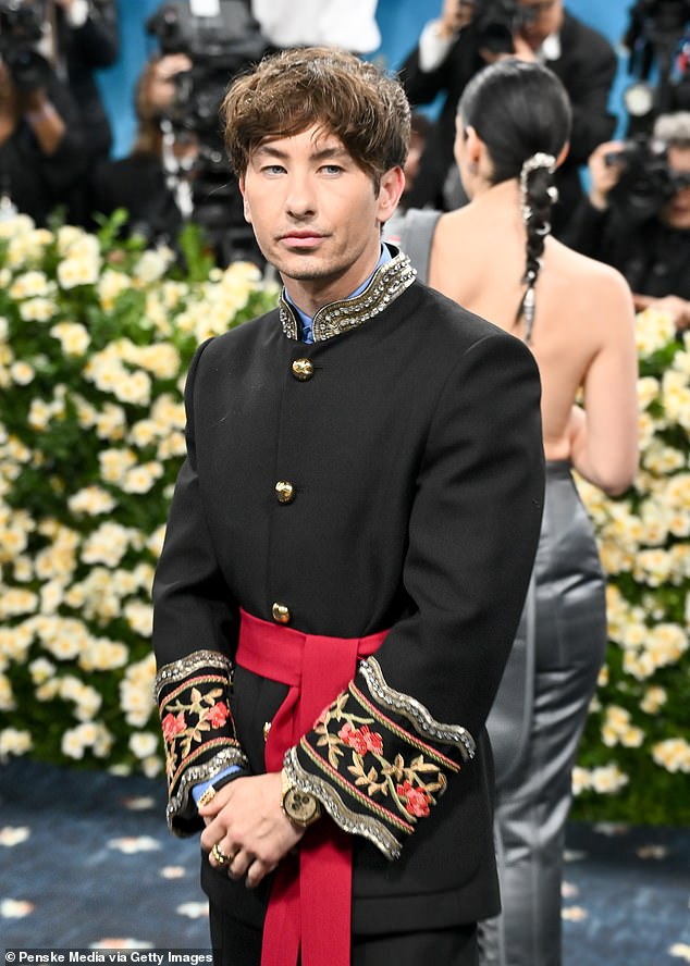 He showed off a new look as he arrived in style