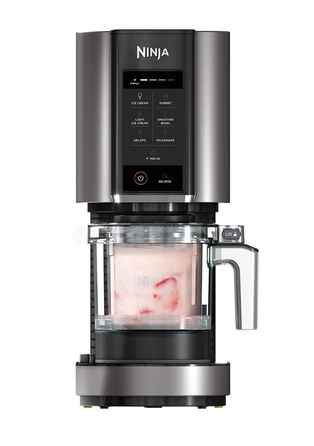 Ninja ice cream maker with strawberry ice cream.