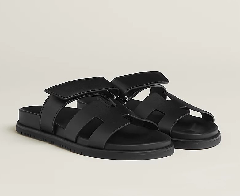 Pair of black leather sandals.