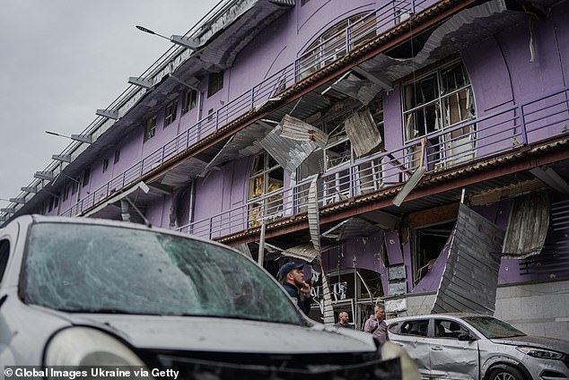 Last month a simulation run in the wake of Vladimir Putin 's full-scale invasion of Ukraine showed Britain could not prevent all strikes getting through. Pictured: Dream Town shopping mall following Russian drone strike on May 4, 2025 in Kyiv