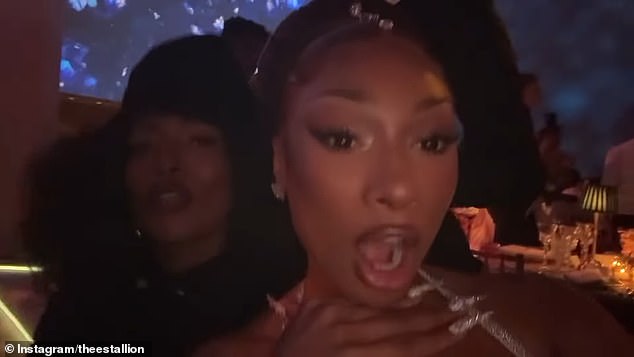 Megan then captured herself with Angela Bassett, who she called 'beautiful' while recording with her in selfie-mode