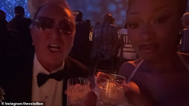 Megan toasted drinks with Michael Kors, who designed her 2025 Met Gala look