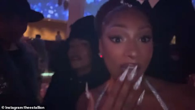 Megan broke Wintour's no cellphone policy to capture moments from fashion's biggest night; Megan seen with Angela Bassett