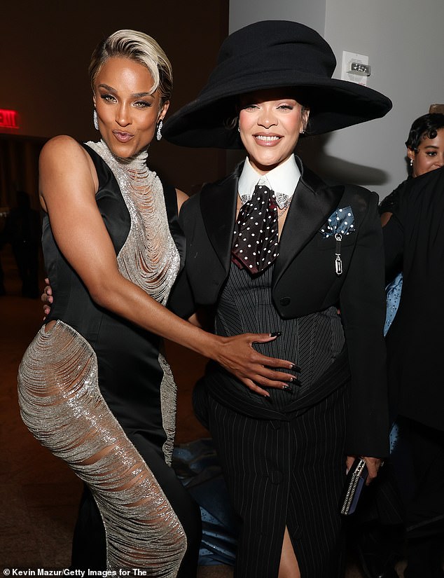 Ciara placed a hand on Rihanna's growing baby bump inside the gala