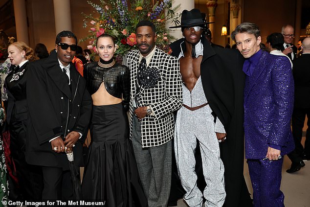 Miley Cyrus flashed her abs in custom Alaia as she united with (L-R) A$AP Rocky Colman Domingo, Alton Mason and Raúl Domingo