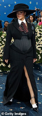 Rihanna confirmed her third pregnancy in a custome AWGE look after arriving nearly an hour late to the event