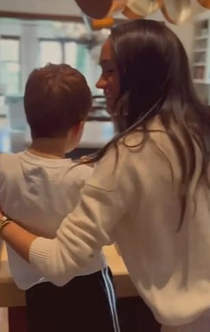 At the end of the Drew Barrymore show, a clip showed Archie eating a biscuit as Meghan leaned in to give him a kiss on the head
