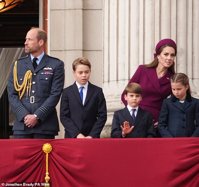 An animated Louis looked to hold his hand out as he and his family viewed the fly past yesterday