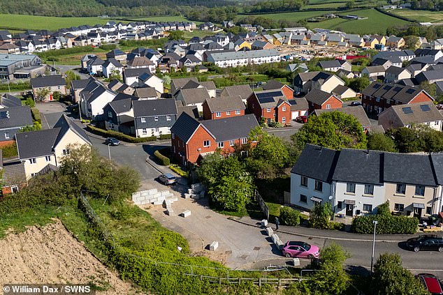 Developers say the walking route is on private land, warning walkers that it is trespassing to pass through