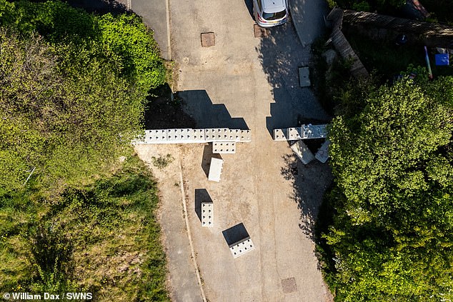 A local reportedly knocked down the wall after renting a JCB