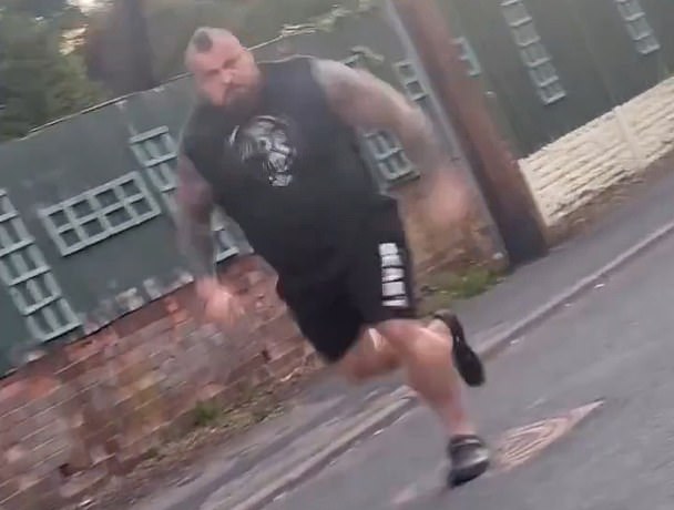 Hall was seen sprinting after the car following the clash
