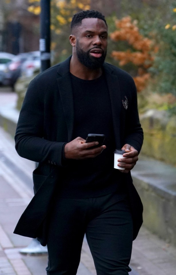 Joleon Lescott and Victor Anichebe arriving at a memorial service.