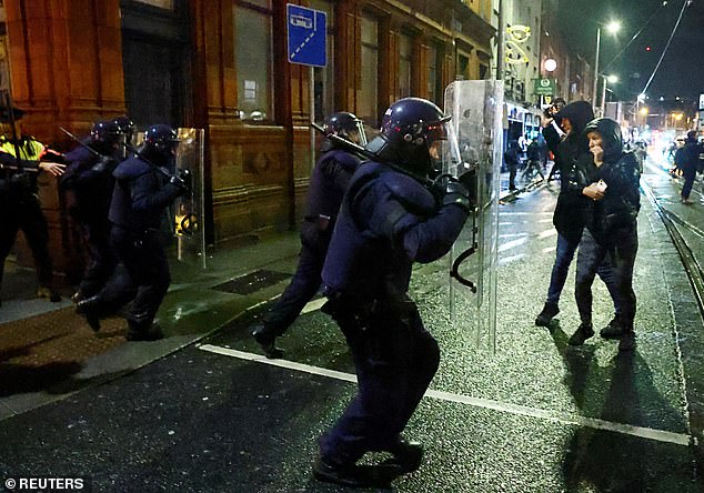 Gardai clashed with rioters in Dublin after several people were injured in a stabbing outside a school in the Irish capital in November 2023