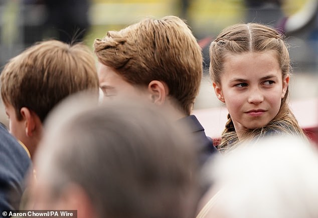 The young princess who turned 10 on Friday wore her hair in braids as she sat alongside her brothers Prince Louis and Prince George