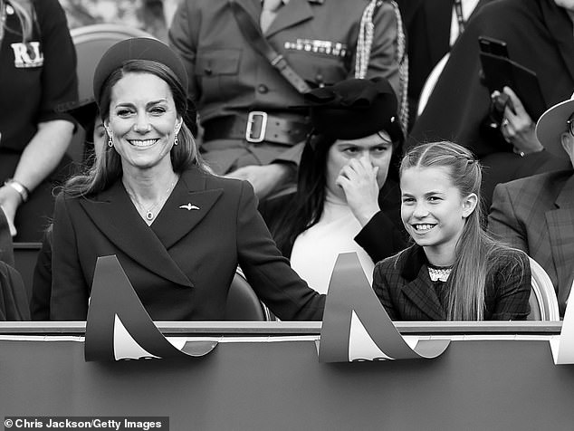Princess Catherine with her 10-year-old daughter Charlotte at yesterday's VE Day parade