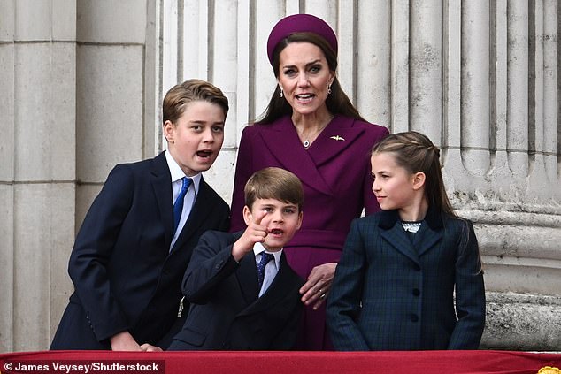 The family looked to be animated and impressed as they took in the fly-past from the balcony