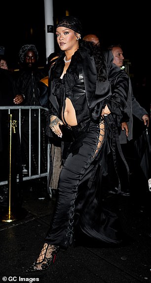 She boosted her height with strappy heels
