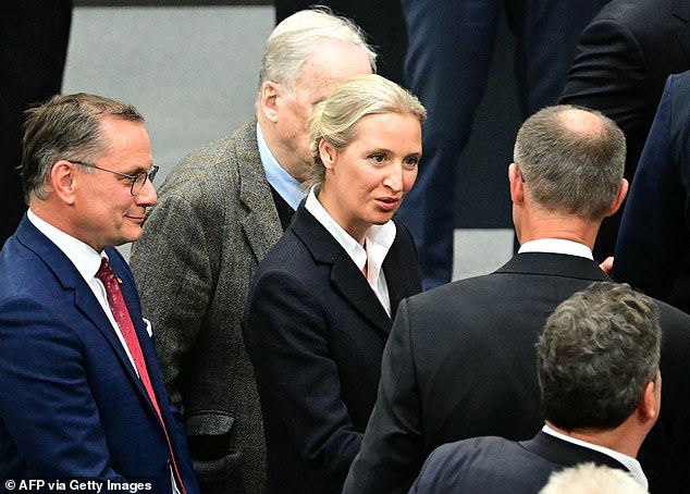 Following the second vote, however, she was seen congratulating Merz on the result