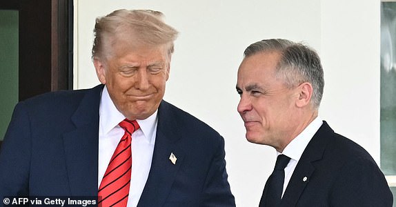 US President Donald Trump greets Canadian Prime Minister Mark Carney as he arrives at the White House in Washington, DC, on May 6, 2025. (Photo by Mandel NGAN / AFP) (Photo by MANDEL NGAN/AFP via Getty Images)