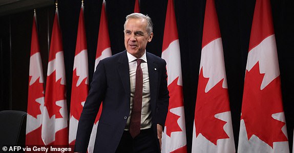 Canada's Prime Minister Mark Carney walks off after a press conference in Ottawa, Ontario, on May 2, 2025. US President Donald Trump said on April 30 that Carney would visit Washington in the coming week, hailing him as "very nice" despite tensions over Trump's tariffs and annexation threats. (Photo by PATRICK DOYLE / AFP) (Photo by PATRICK DOYLE/AFP via Getty Images)