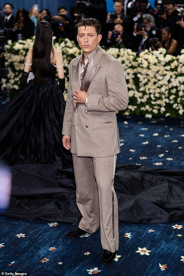 Scherzinger's Sunset Boulevard co-star Tom Francis, pictured Monday night, was included in Vogue's round-up of all the stars who attended the Met Gala