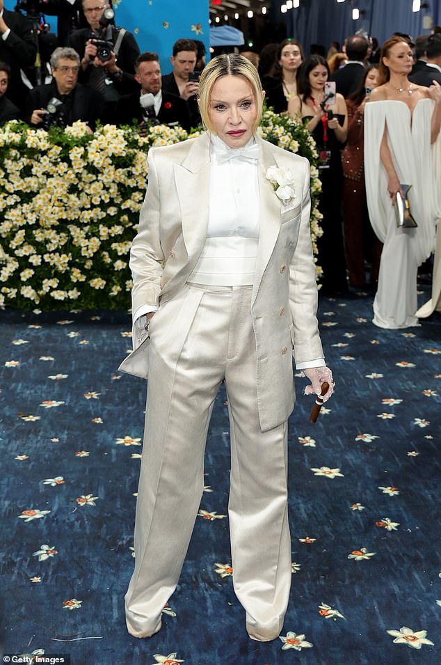 Madonna, in Tom Ford, looked to have borrowed someone else's suit