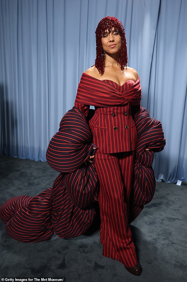 Alicia Keys looked as if she was still in her duvet in the red pinstriped number by Moncler