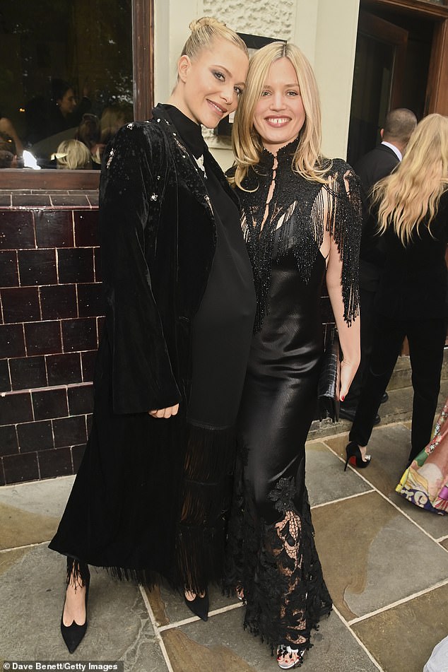 Joining the actress and model at the celebration was her pregnant sister Poppy (L) and pal Georgia May Jagger (R)