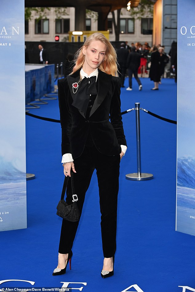 Lady Mary Charteris slipped into a black velour suit